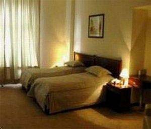 Standard single with private facilities, and breakfast